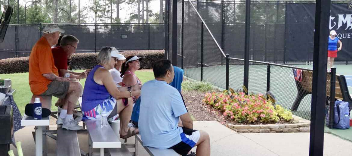 Proper Etiquette for Team Members Watching a Tennis Match